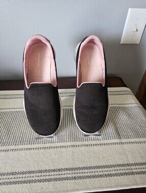 Skechers Women's Black Slip-On Sneakers with Pink Lining